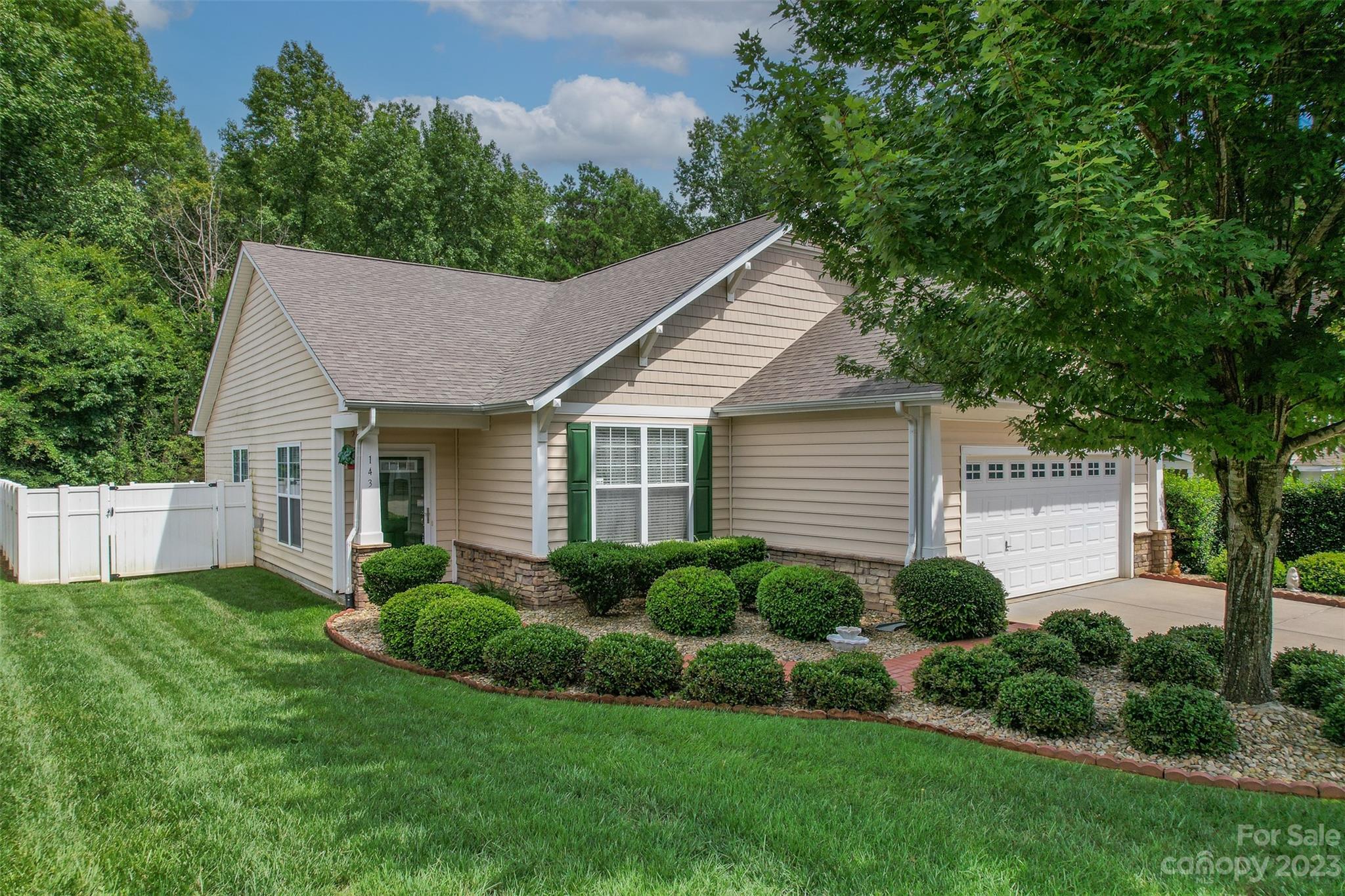 143 Whitley Mills Road Fort Mill, SC 29708 - Photo 1 of 28 a view of a house with backyard and garden