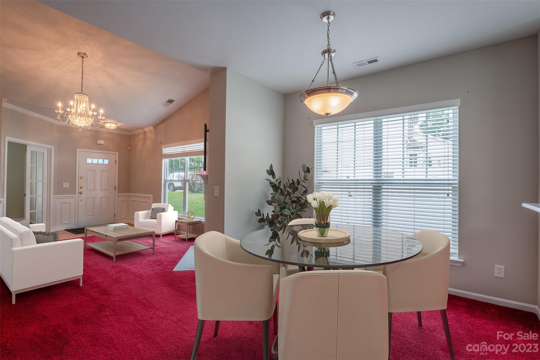 143 Whitley Mills Road Fort Mill, SC 29708 - Photo 12 of 28 a dining room with furniture a chandelier and window