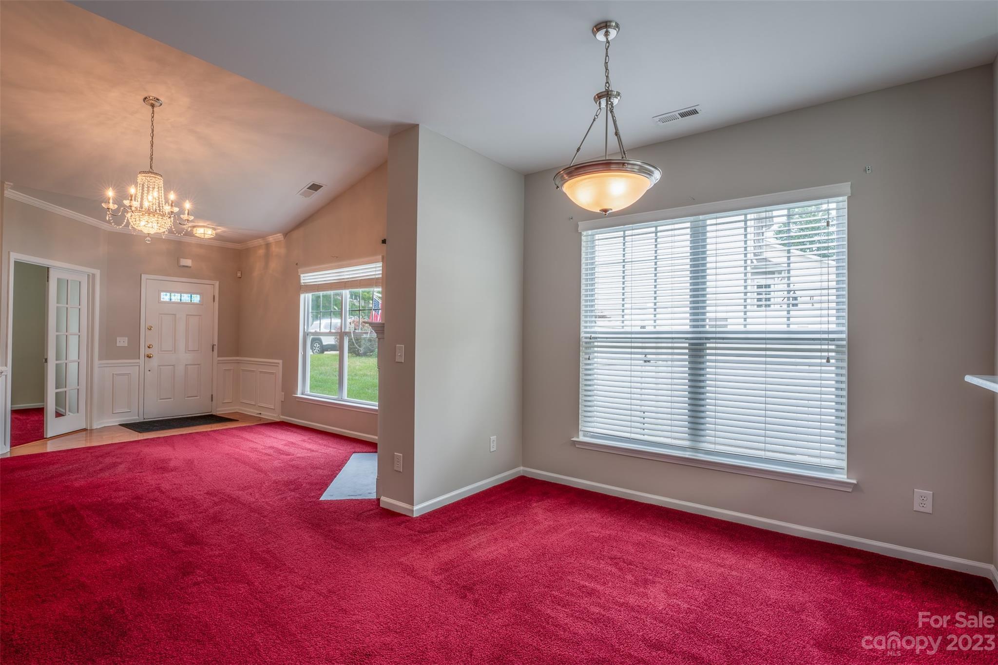 143 Whitley Mills Road Fort Mill, SC 29708 - Photo 13 of 28 a view of an empty room with window and chandelier