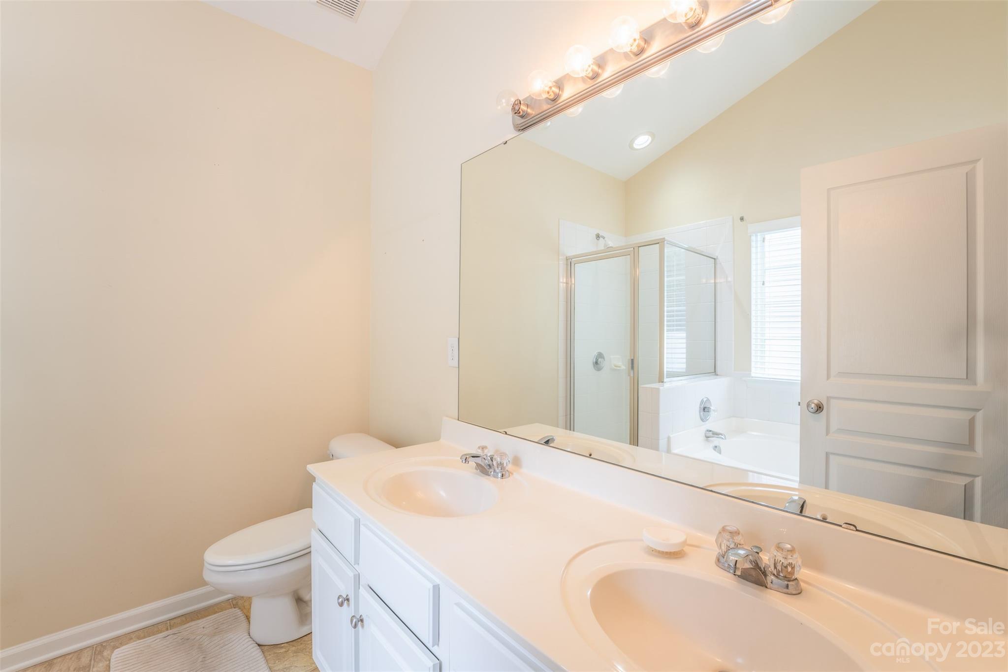 143 Whitley Mills Road Fort Mill, SC 29708 - Photo 20 of 28 a bathroom with a sink and a toilet