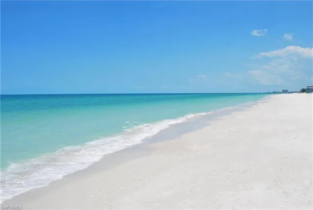 a view of a room with a big yard