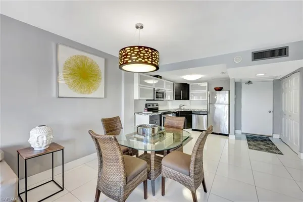 a view of a dining room with furniture