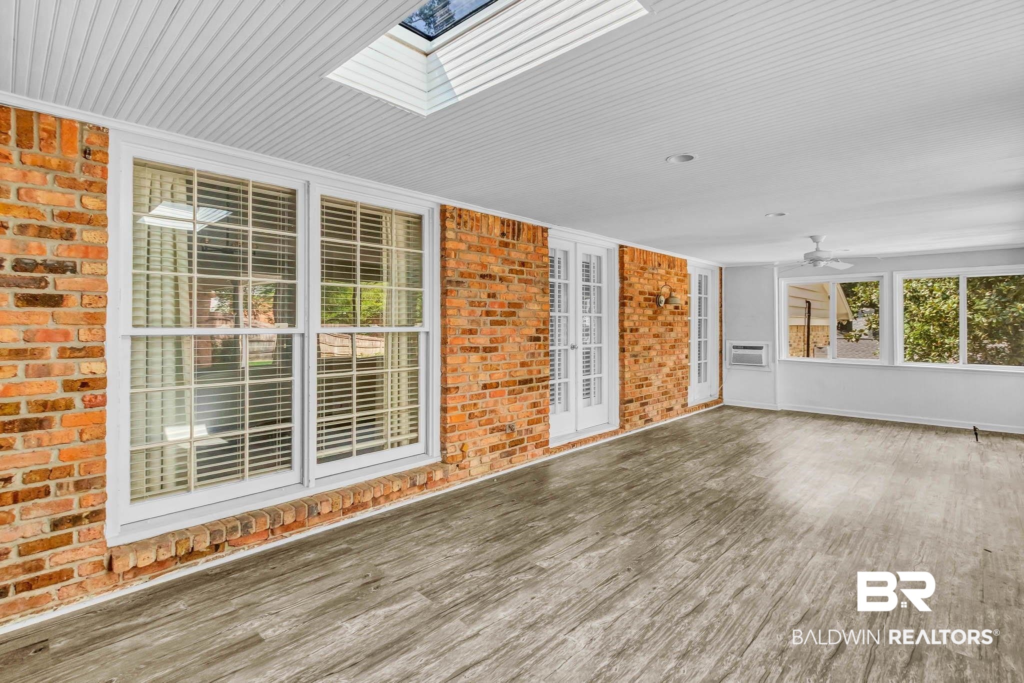 309 West Brandy Run Road Mobile, AL 36608 - Photo 76 of 100 Unfurnished sunroom with a skylight