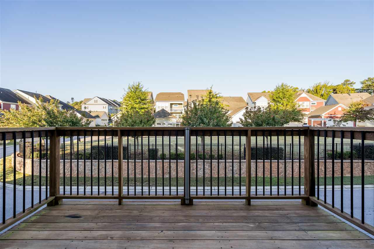1521 Rodessa Run Raleigh, NC 27607 - Photo 19 of 29 Back deck opens off the dining area and overlooks the sunset and pocket park. Back Deck