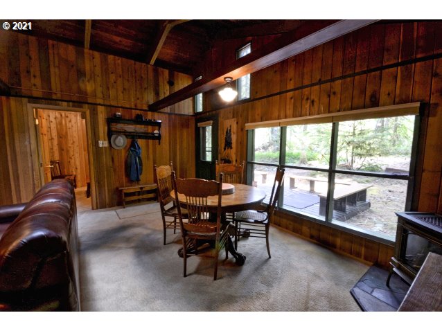 28730 Road 20 Rhododendron, OR 97049 - Photo 7 of 28 a view of a dining room with furniture window and outside view