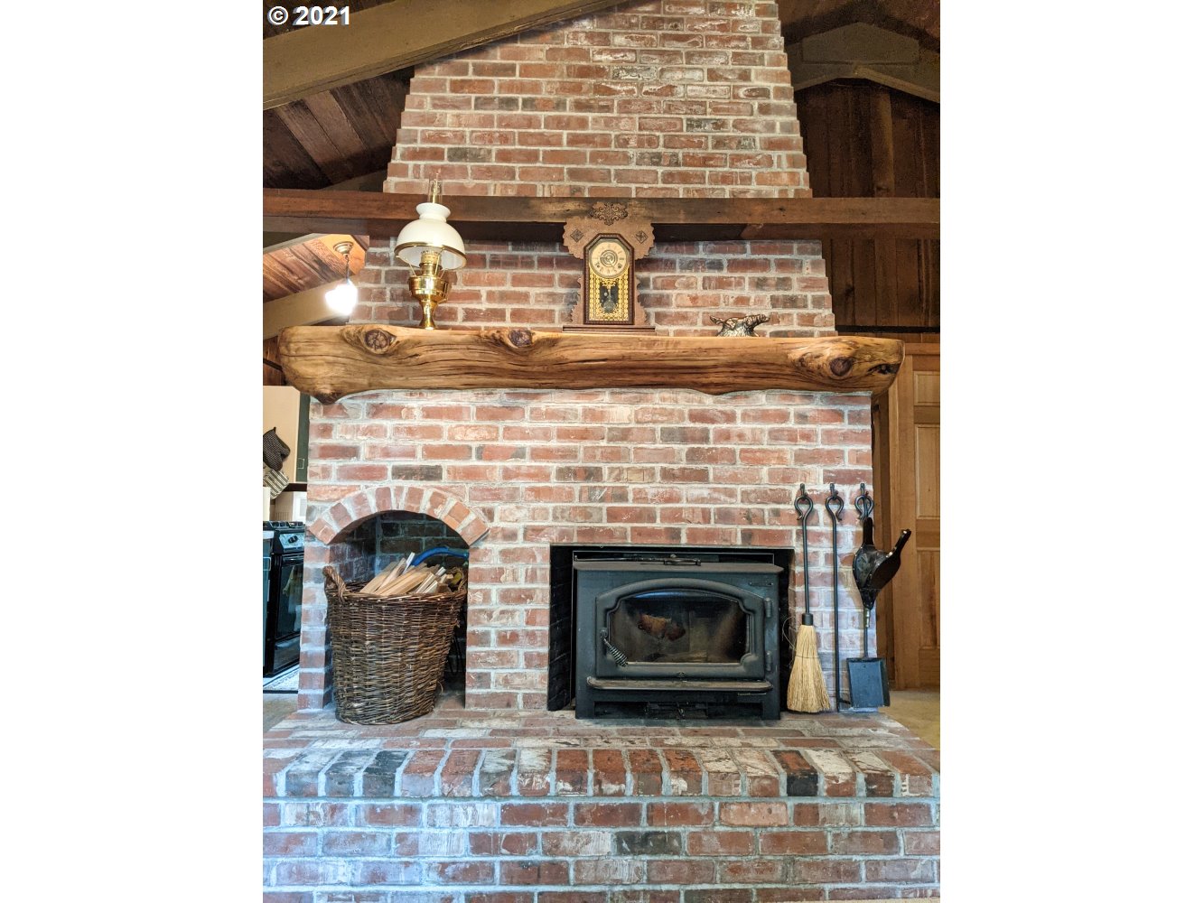 28730 Road 20 Rhododendron, OR 97049 - Photo 8 of 28 a close view of fireplace with wooden floor