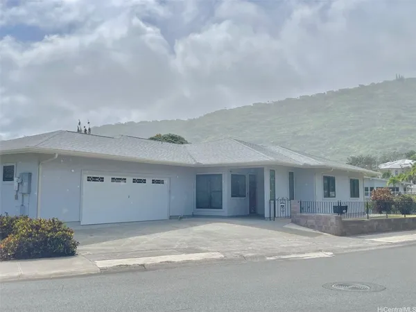 a view of a balcony with furniture