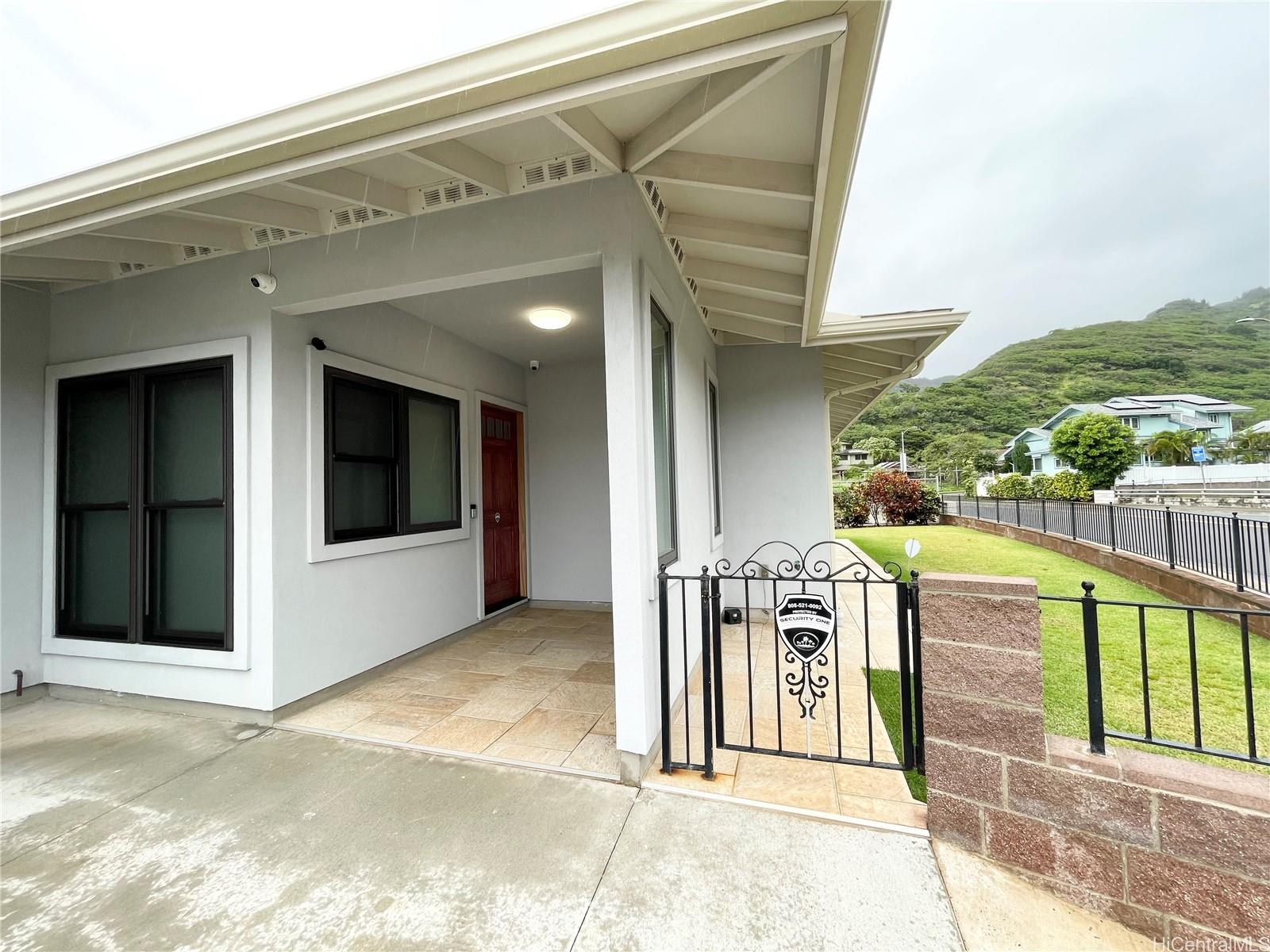 457 Halemaumau Street Honolulu, HI 96821 - Photo 2 of 25 a view of a balcony with furniture