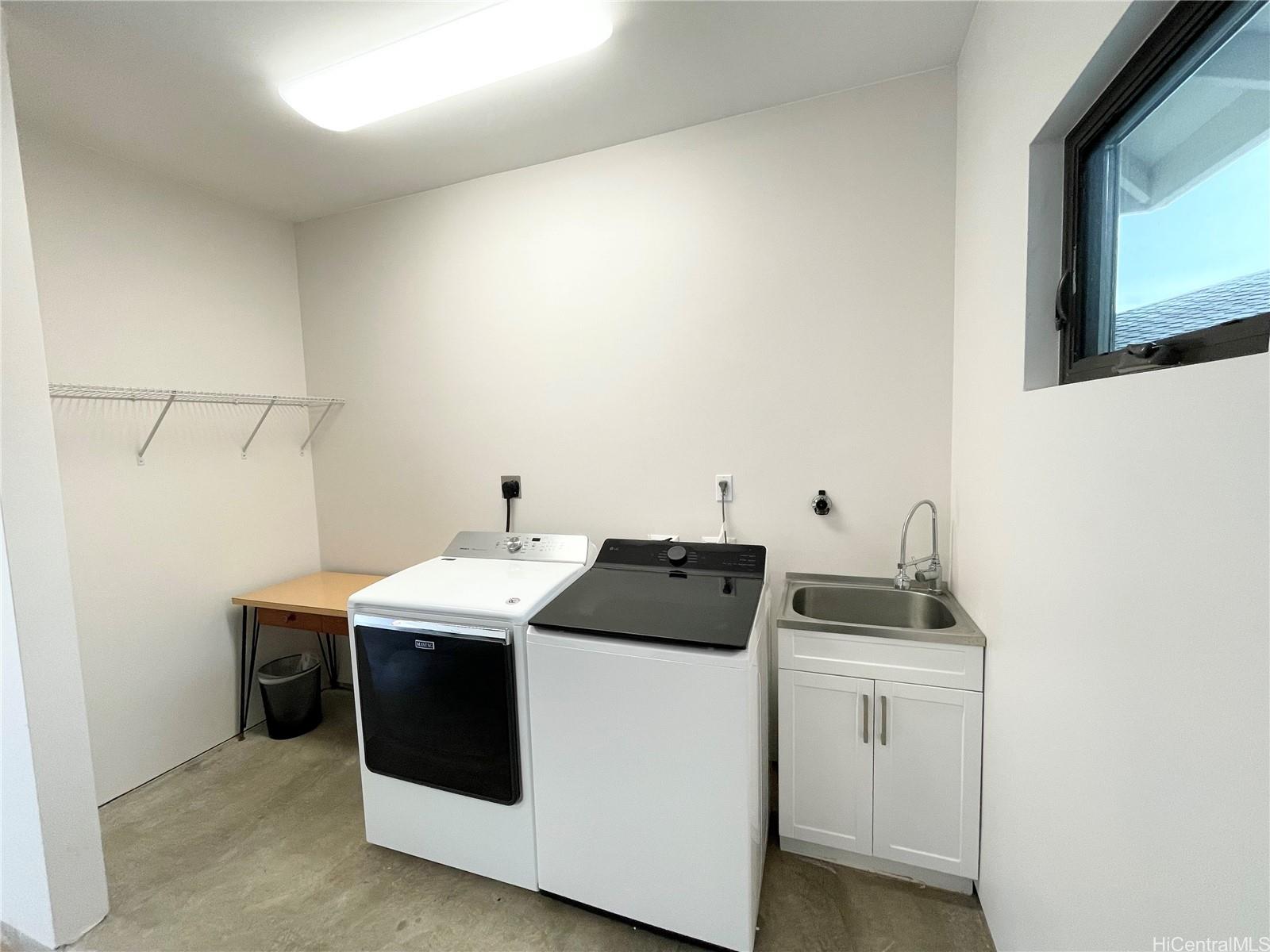 457 Halemaumau Street Honolulu, HI 96821 - Photo 24 of 25 a utility room with dryer and washer