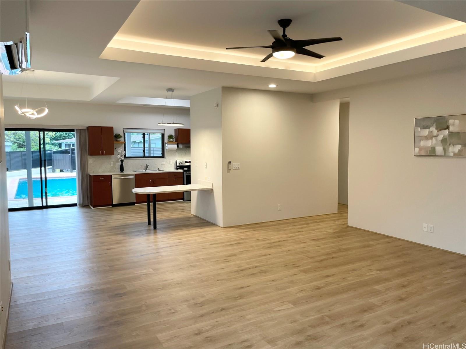 457 Halemaumau Street Honolulu, HI 96821 - Photo 6 of 25 a view of an empty room with a window