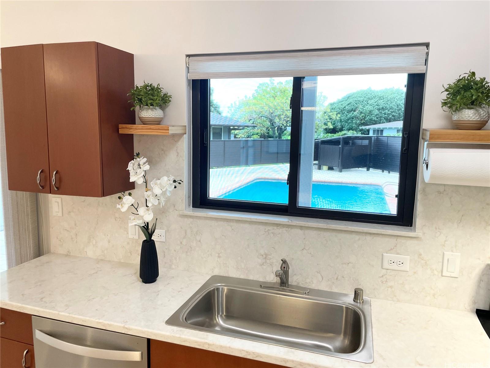 457 Halemaumau Street Honolulu, HI 96821 - Photo 8 of 25 a close view of sink and tap