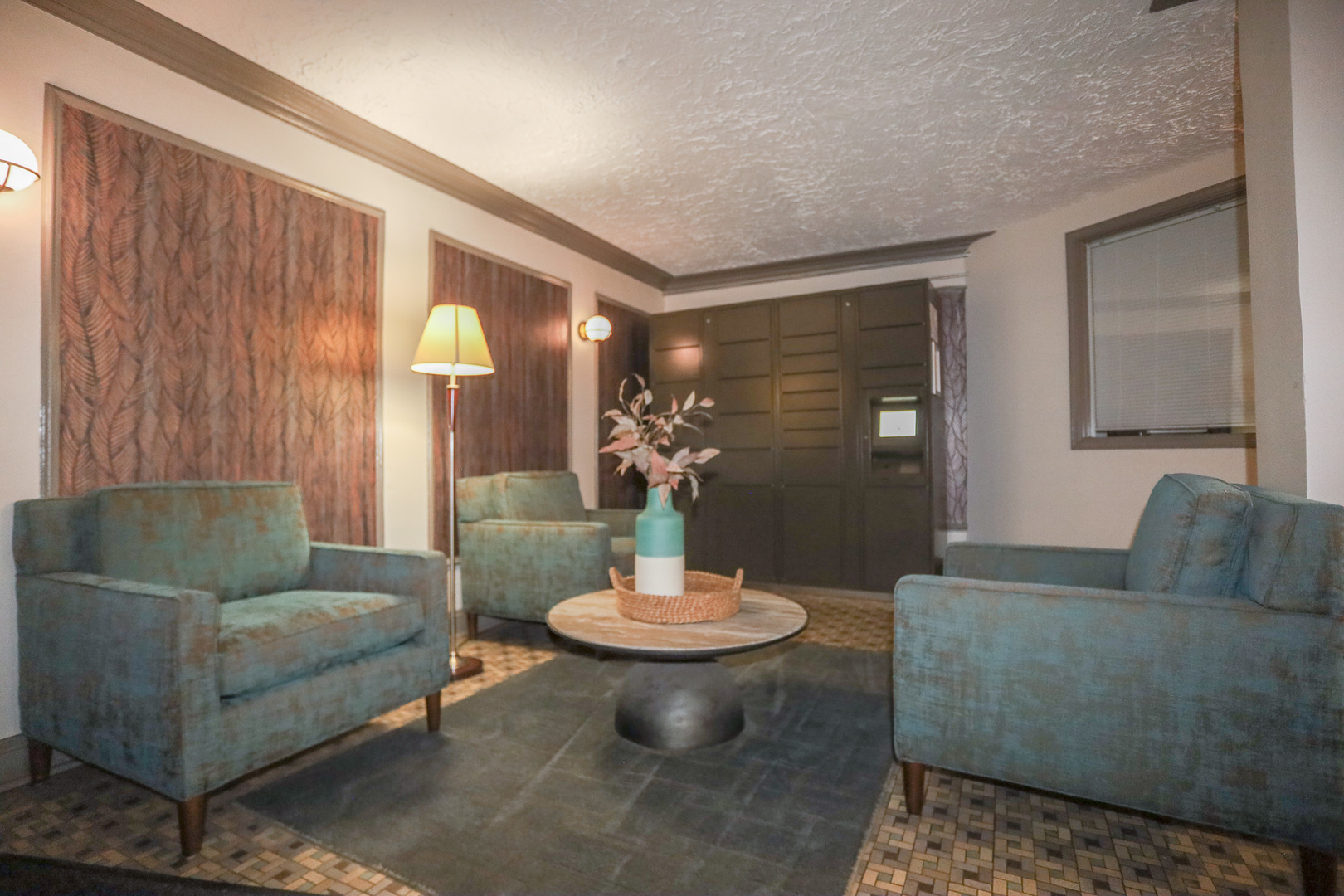 5417 South Harper Avenue, Unit 3A Chicago, IL 60615 - Photo 6 of 8 a living room with furniture and a mirror