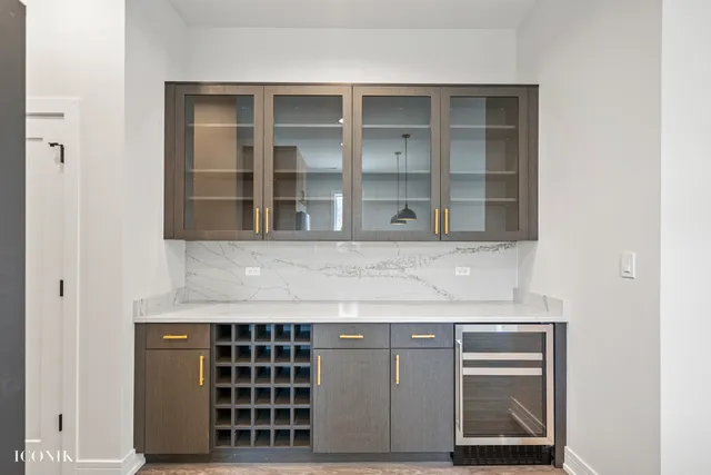 a kitchen with a cabinets and window