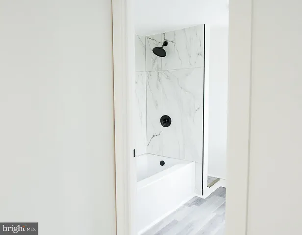 a bathroom with a bathtub