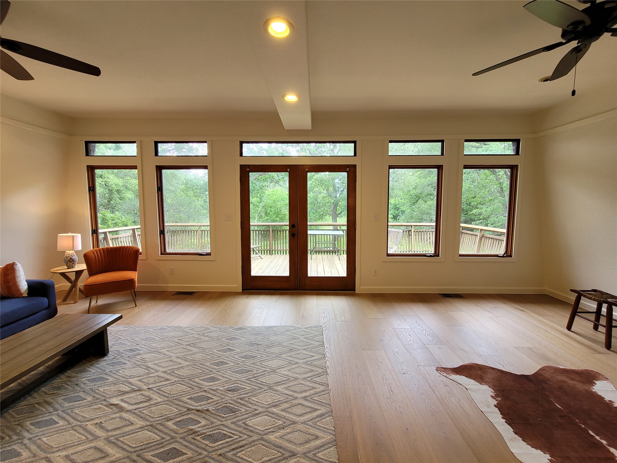 281 Earl Callahan Road, Unit A Cedar Creek, TX 78612 - Photo 4 of 39 a view of a room with window and lounge chair