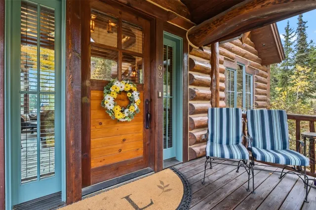 a view of a city with lush green forest