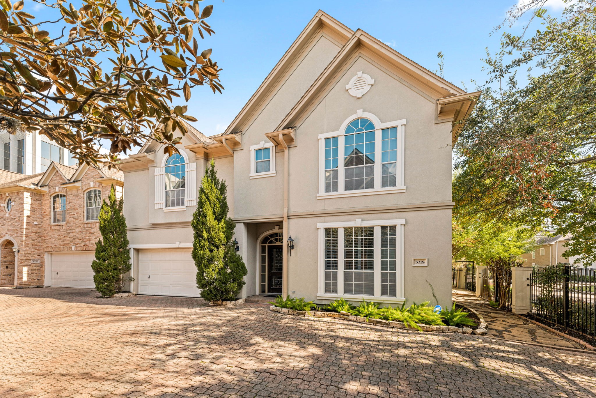 5318 Fayette Street Houston, TX 77056 - Photo 3 of 35 a view of a house with a yard and large tree
