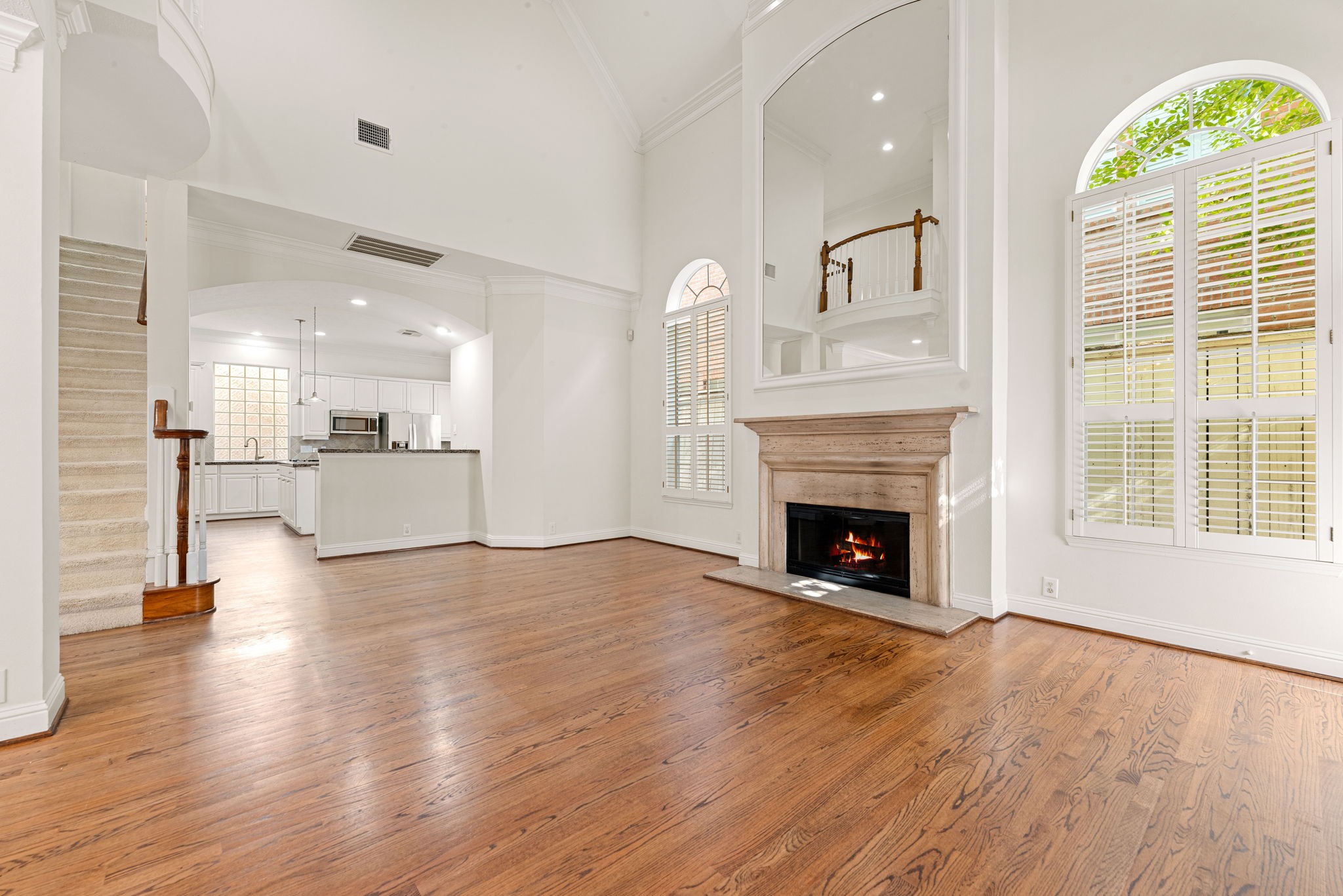 5318 Fayette Street Houston, TX 77056 - Photo 7 of 35 a view of a livingroom with a fireplace a fireplace and windows