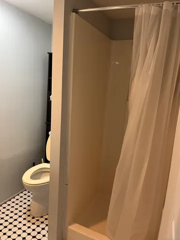 a room with a closet and storage