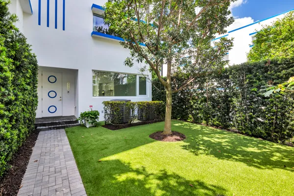 a view of a backyard with garden