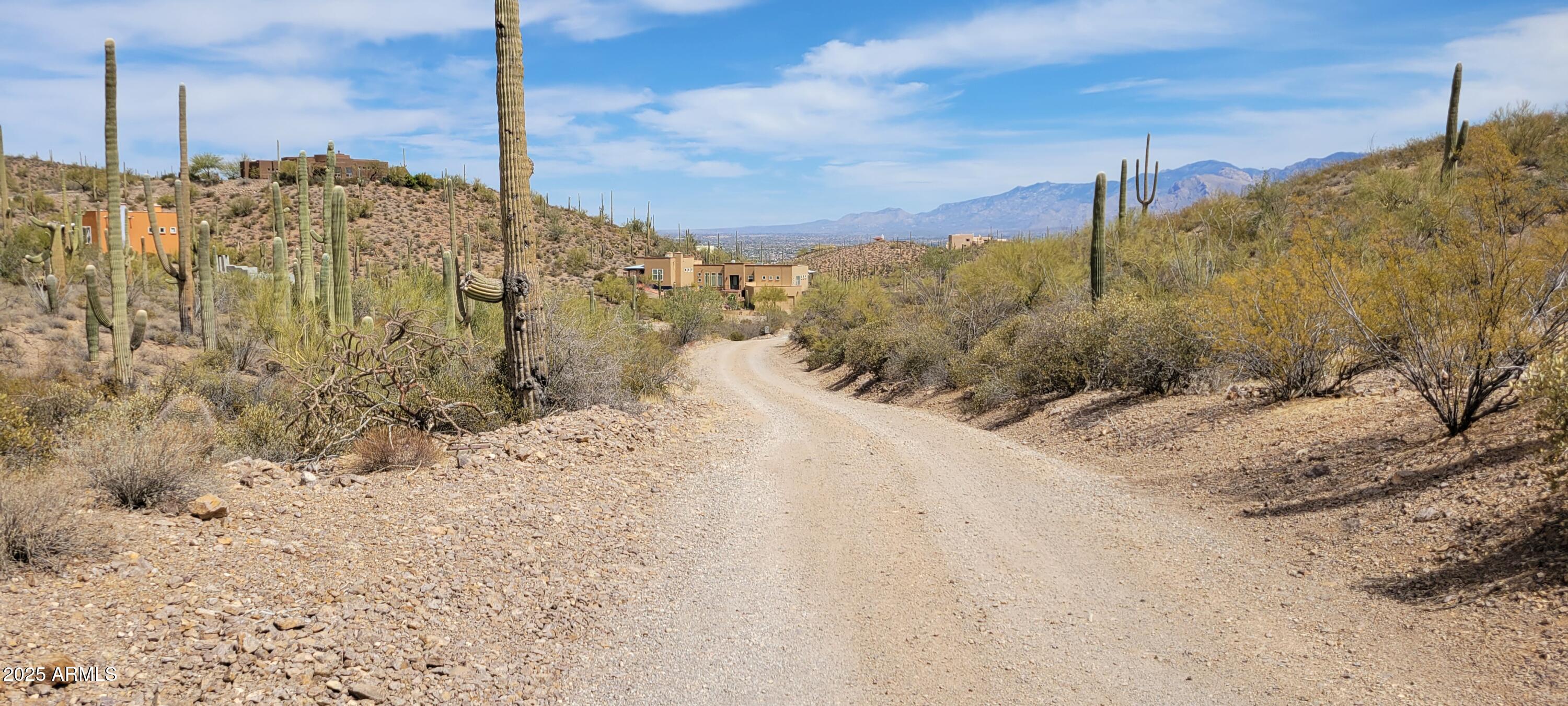4790 North El Adobe Ranch Road Tucson, AZ 85745 - Photo 3 of 26 a view of a snow on the beach