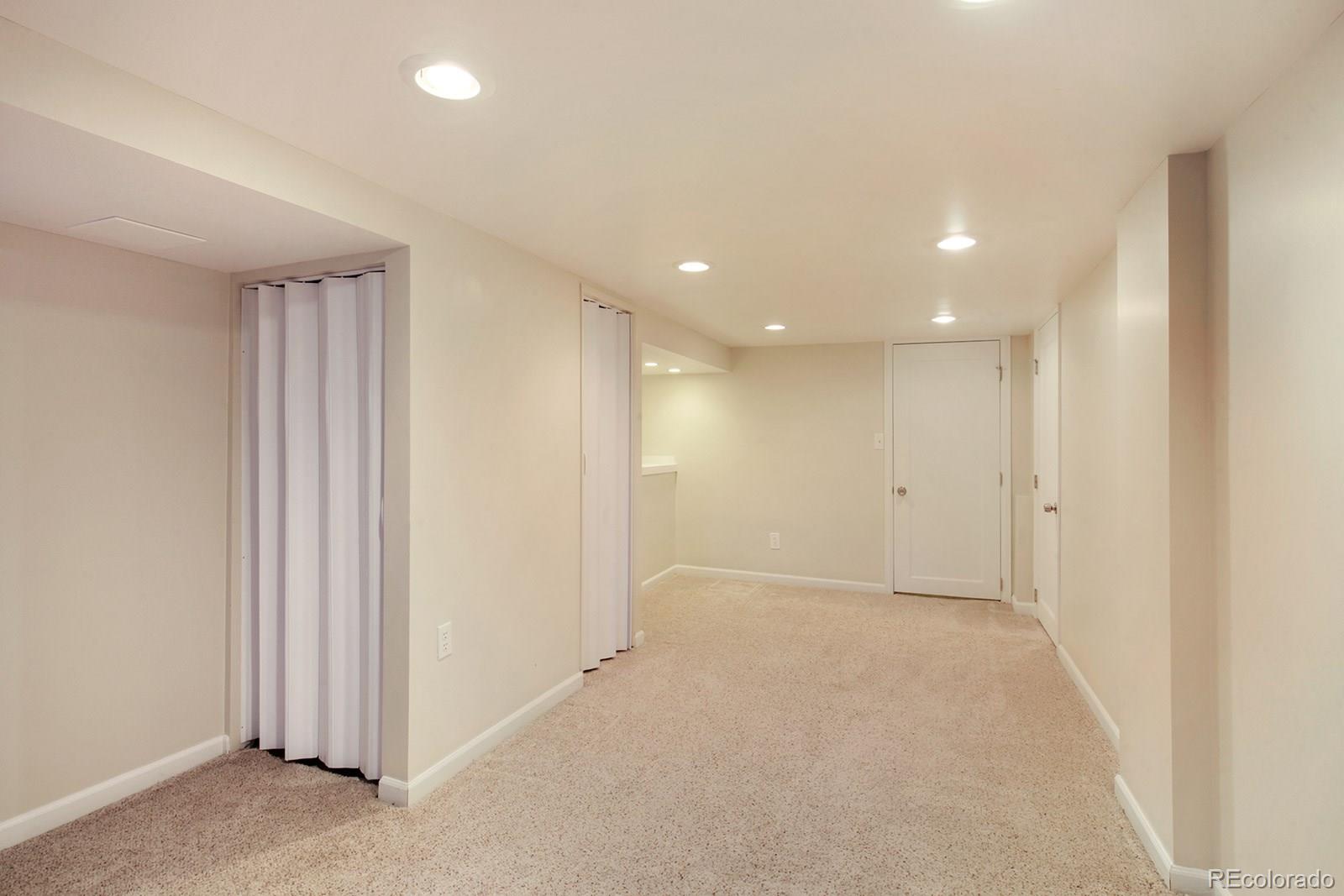 3877 Perry Street Denver, CO 80212 - Photo 15 of 23 an empty room with windows