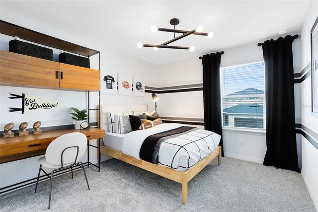 a bedroom with a bed and a closet