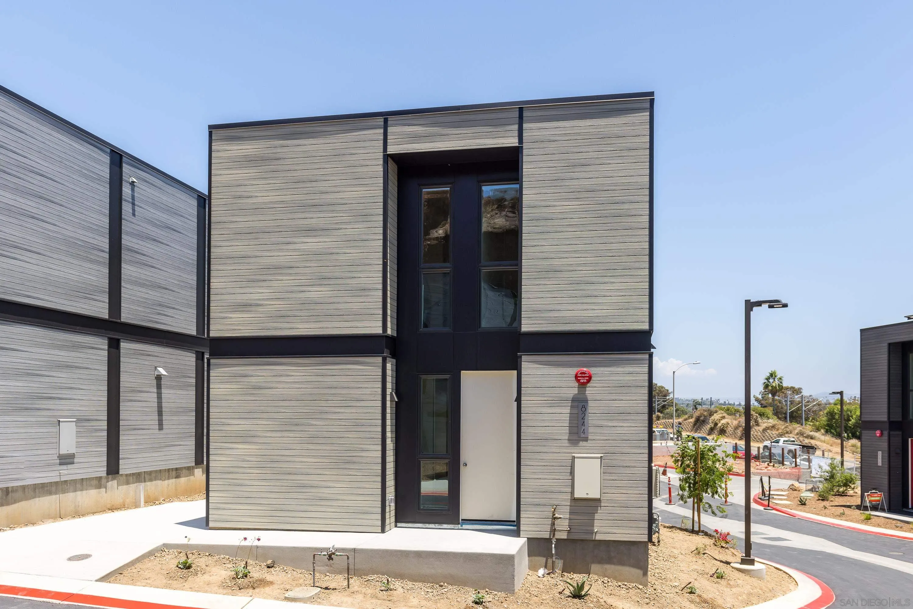 a front view of a house with street