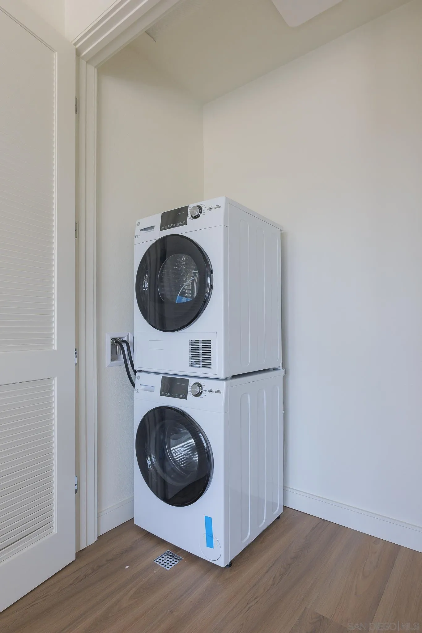 8244 High Street La Mesa, CA 91941 - Photo 8 of 27 a utility room with dryer and washer