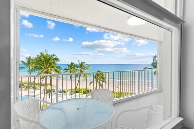 a view of balcony with a potted plant