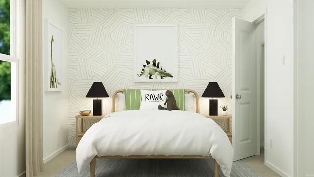 a bed room with a bed and a lamp on table