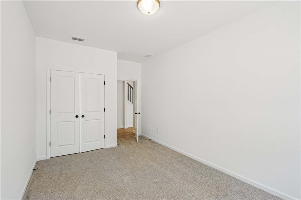240 Silverleaf Trail Bethlehem, GA 30620 - Photo 12 of 39 a view of an empty room