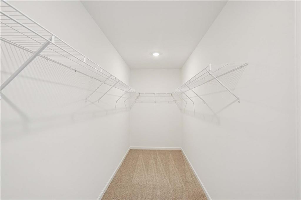 240 Silverleaf Trail Bethlehem, GA 30620 - Photo 15 of 39 a view of a room with racks on the wall