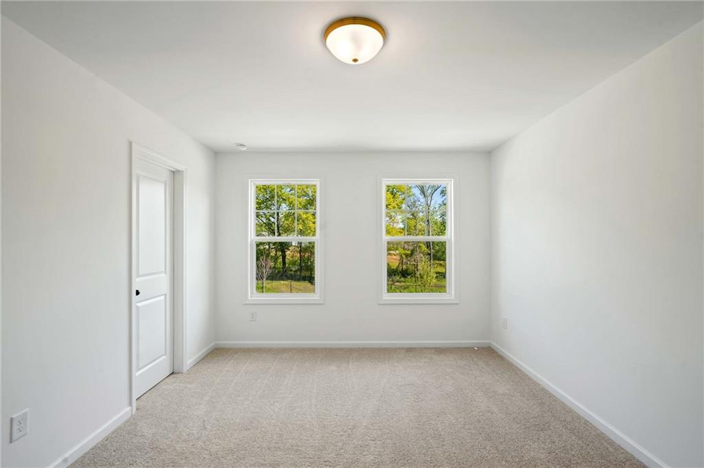 240 Silverleaf Trail Bethlehem, GA 30620 - Photo 18 of 39 an empty room with a window