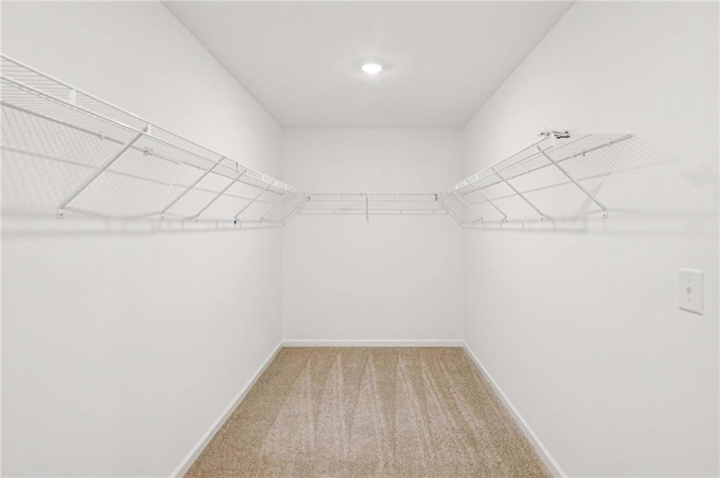 240 Silverleaf Trail Bethlehem, GA 30620 - Photo 25 of 39 a view of a room with racks on the wall
