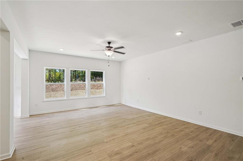240 Silverleaf Trail Bethlehem, GA 30620 - Photo 4 of 39 a view of an empty room with a window