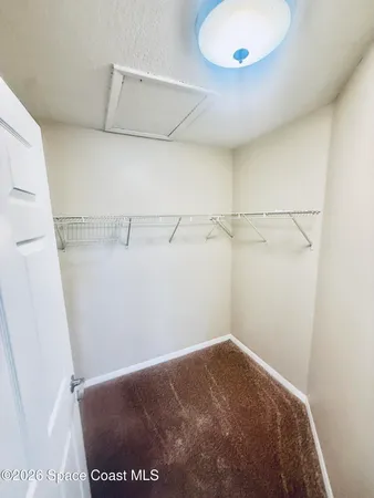 a view of a room with racks on the wall