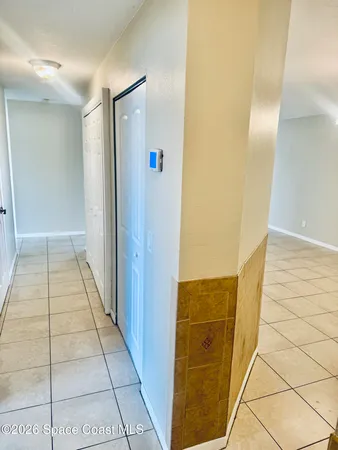 a view of hallway with shower