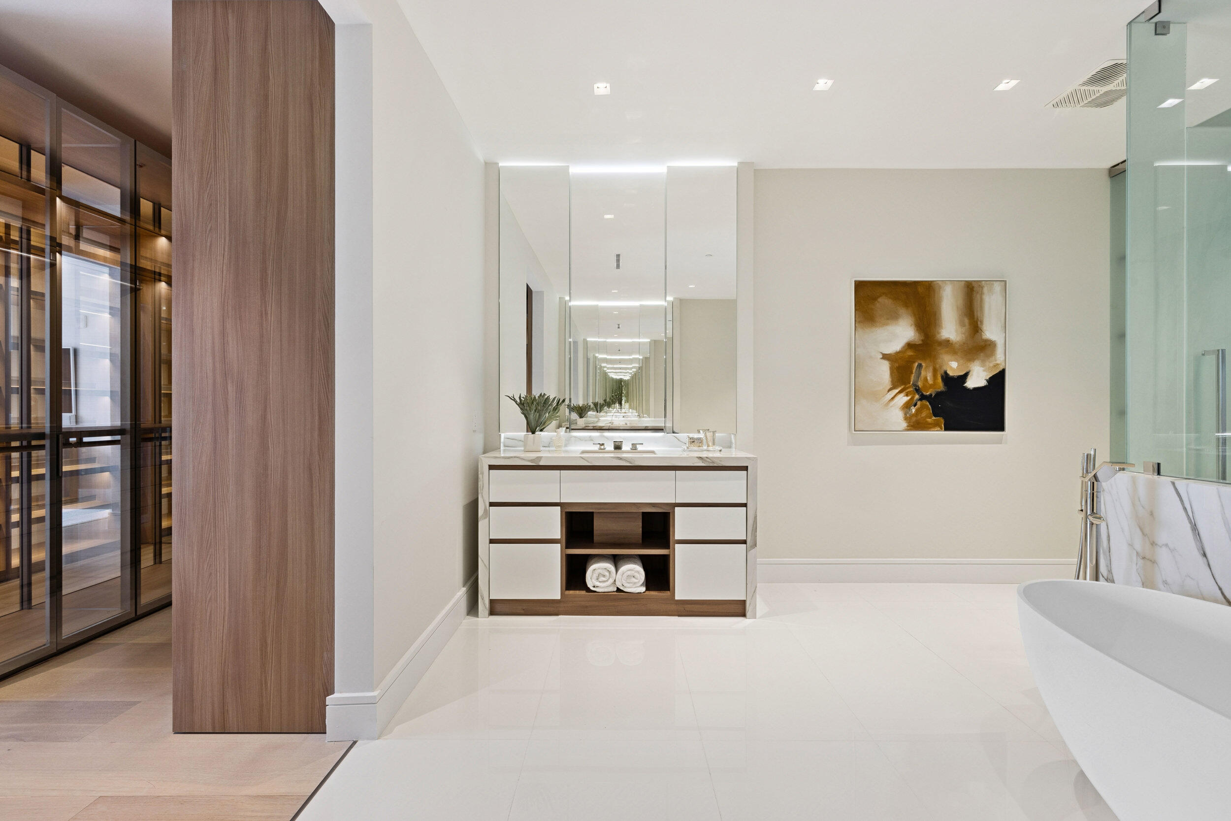 725 South Ocean Boulevard, Unit 402 Boca Raton, FL 33432 - Photo 17 of 41 a living room with a sink and a painting on the wall