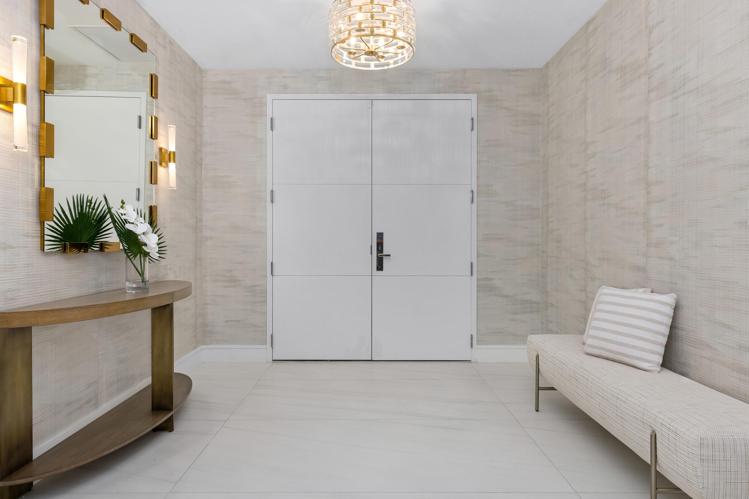 725 South Ocean Boulevard, Unit 402 Boca Raton, FL 33432 - Photo 2 of 41 a living room with furniture and a fireplace