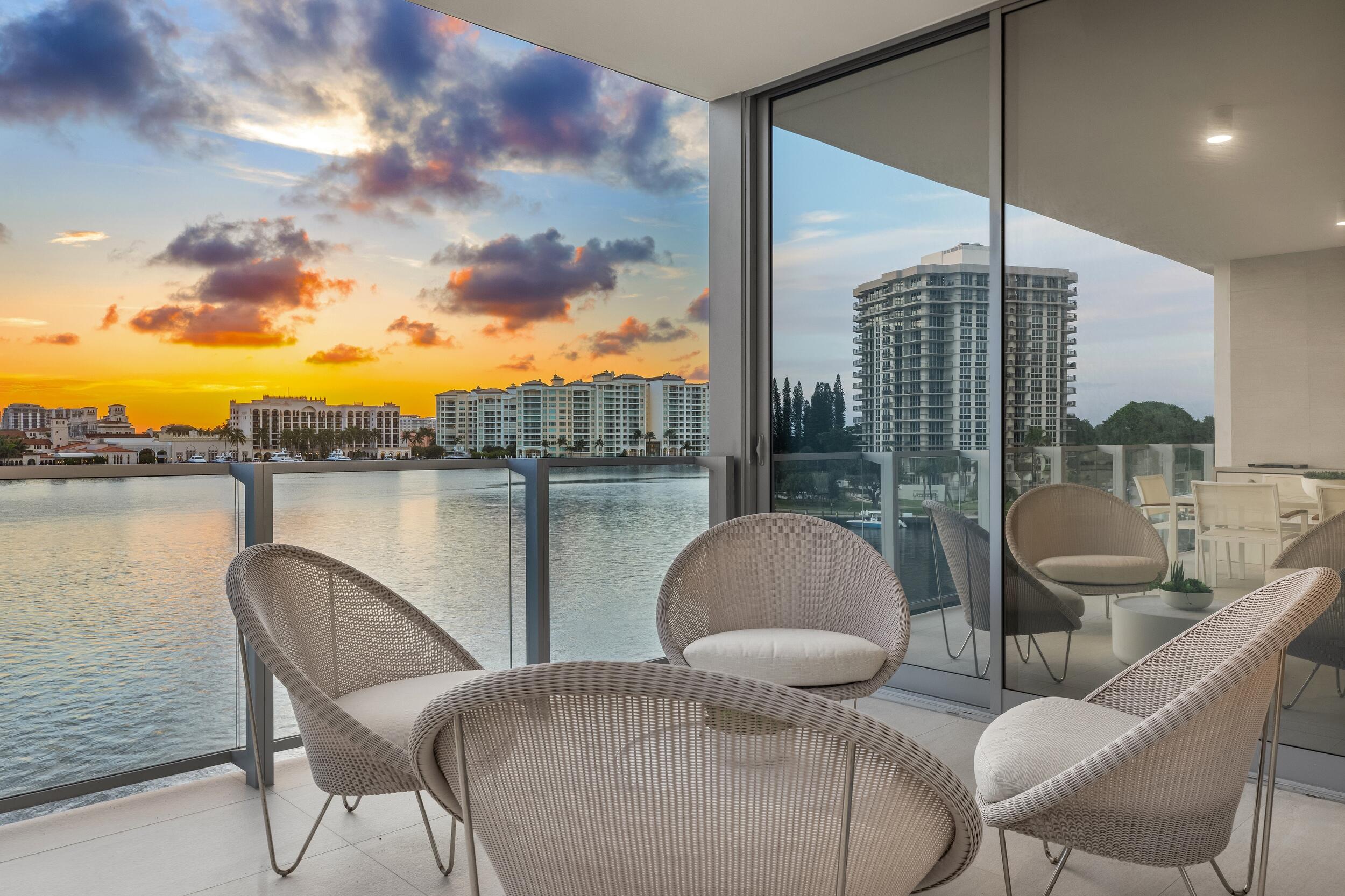 725 South Ocean Boulevard, Unit 402 Boca Raton, FL 33432 - Photo 33 of 41 a balcony with table and chairs