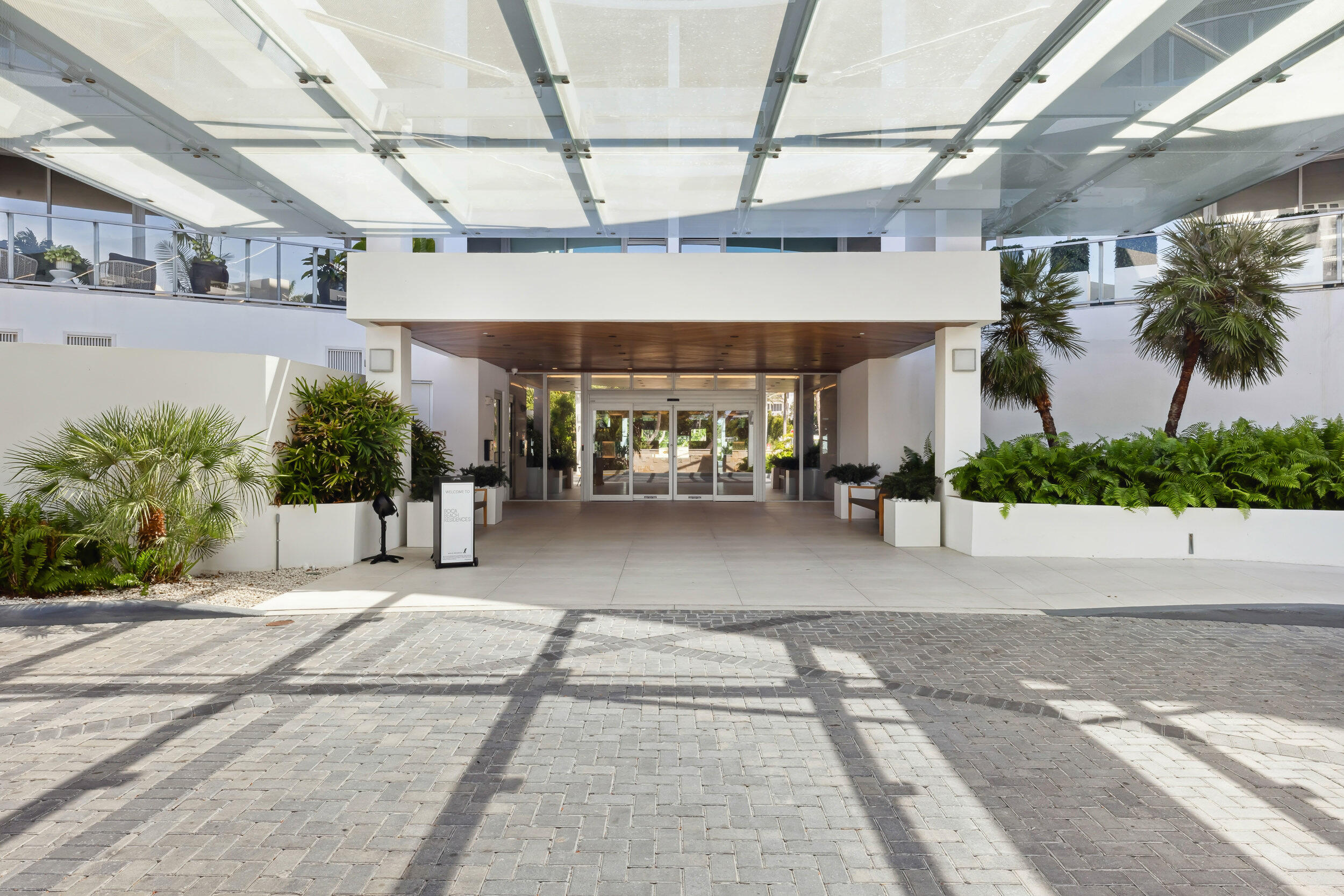 725 South Ocean Boulevard, Unit 402 Boca Raton, FL 33432 - Photo 39 of 41 a view of a building with a patio