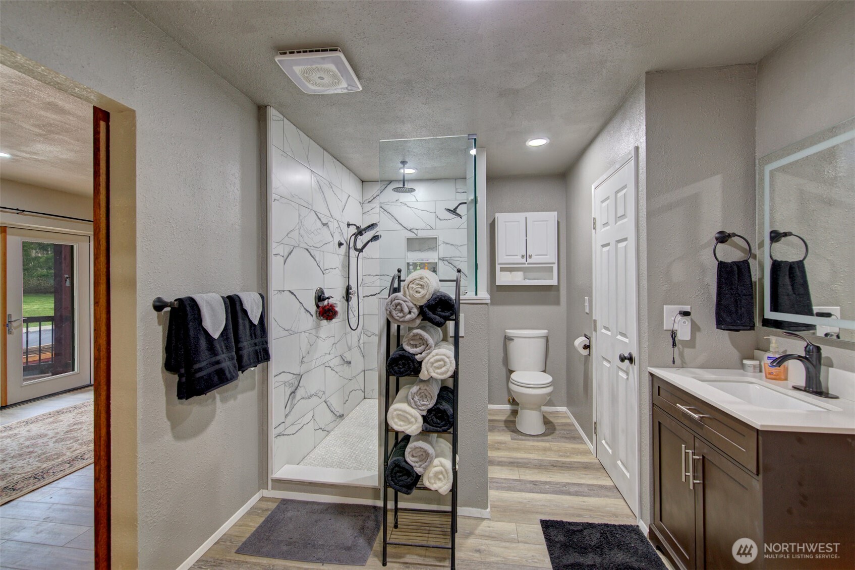 15714 Forty Five Road Arlington, WA 98223 - Photo 25 of 40 a walk in closet with a mirror