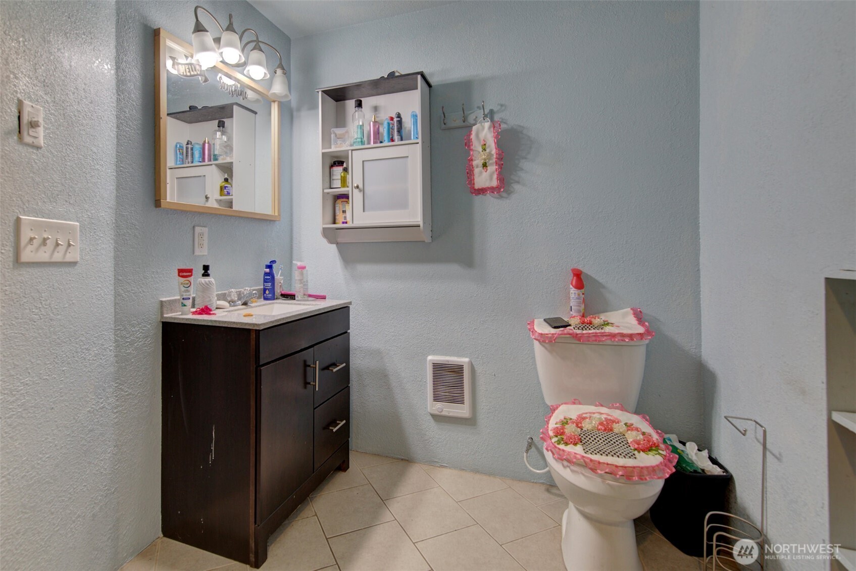 15714 Forty Five Road Arlington, WA 98223 - Photo 31 of 40 a bathroom with a sink mirror and toilet
