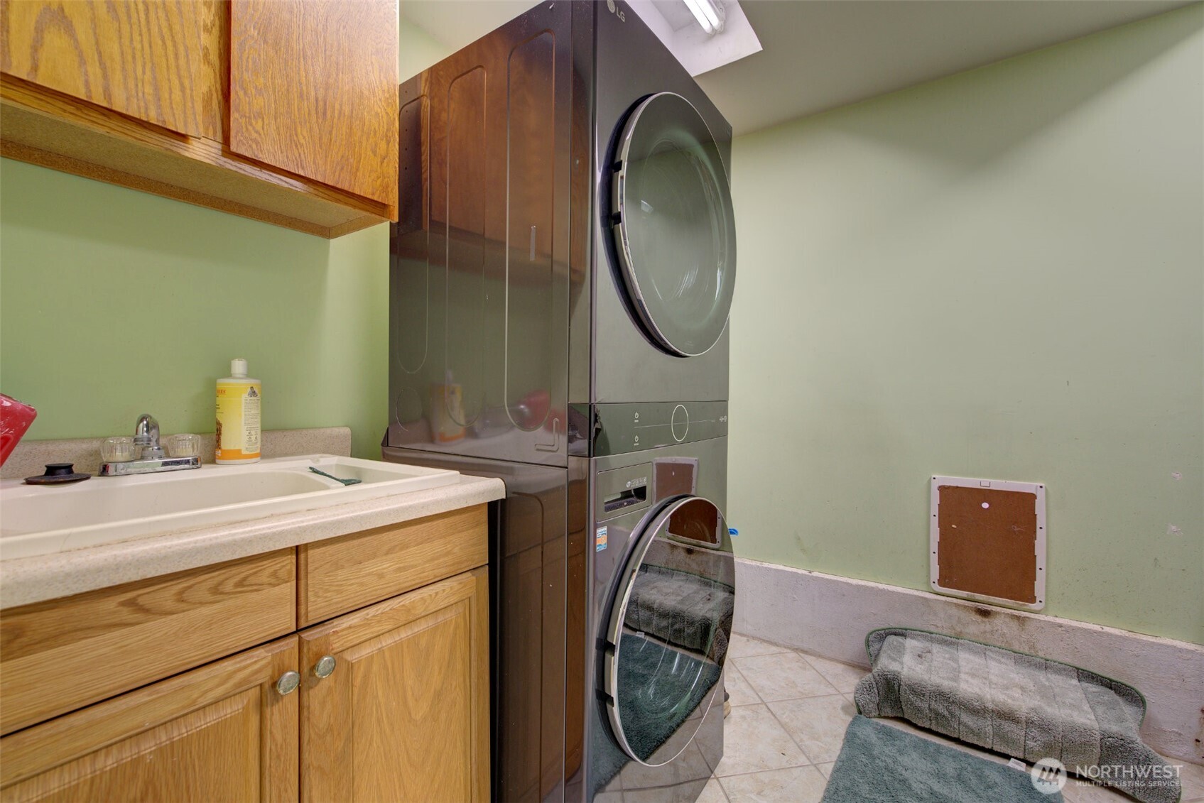 15714 Forty Five Road Arlington, WA 98223 - Photo 34 of 40 a bathroom with a sink and a mirror