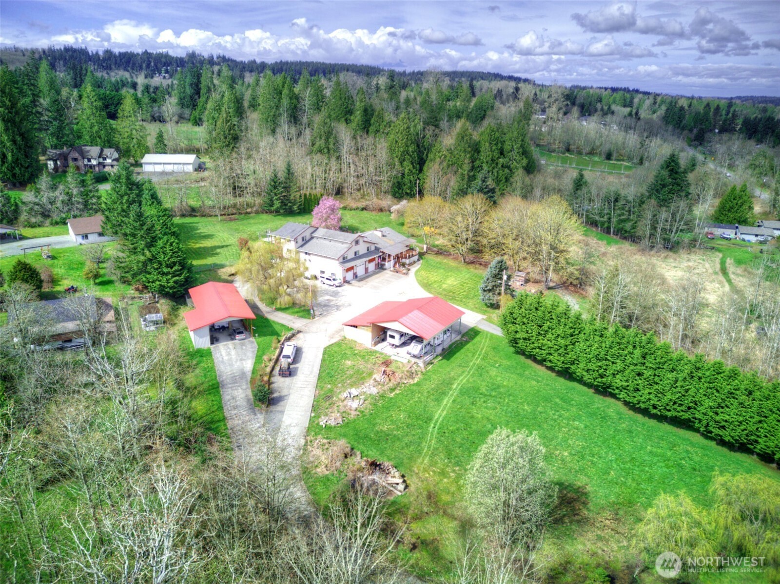 15714 Forty Five Road Arlington, WA 98223 - Photo 38 of 40 a view of a table and chairs in the garden
