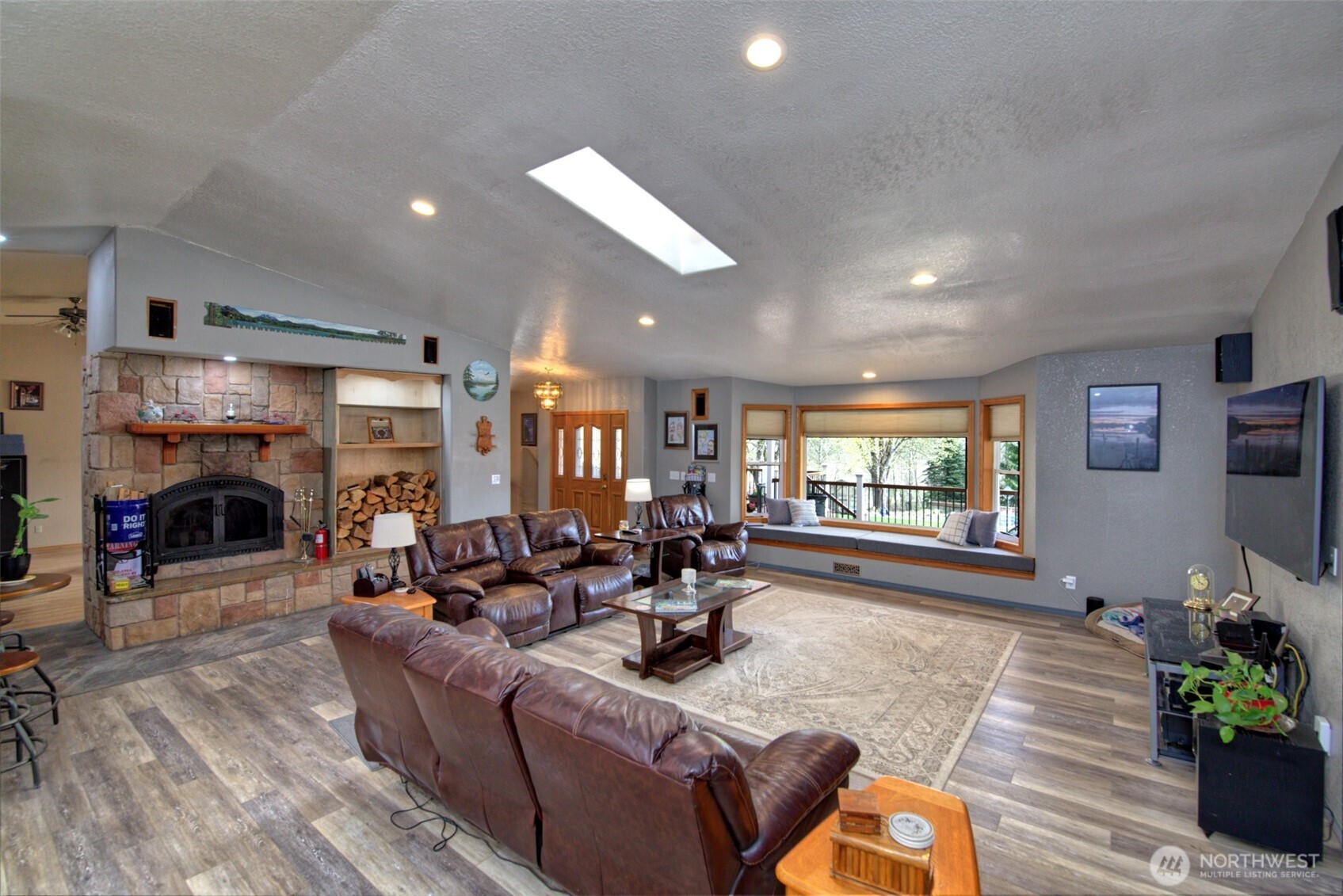 15714 Forty Five Road Arlington, WA 98223 - Photo 6 of 40 a living room with fireplace furniture and a fireplace