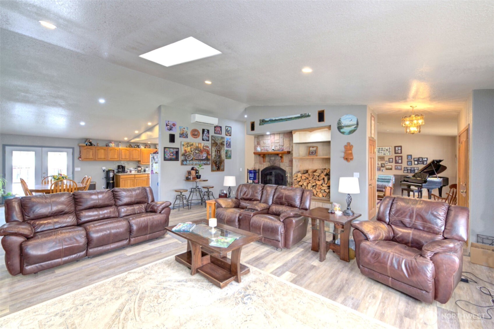 15714 Forty Five Road Arlington, WA 98223 - Photo 7 of 40 a living room with furniture and a large mirror with potted plants