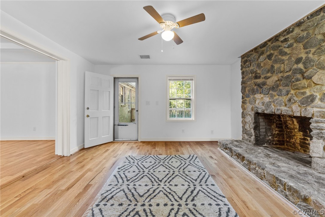 910 Jamestown Road Colonial Heights, VA 23834 - Photo 12 of 28 an empty room with windows and fireplace