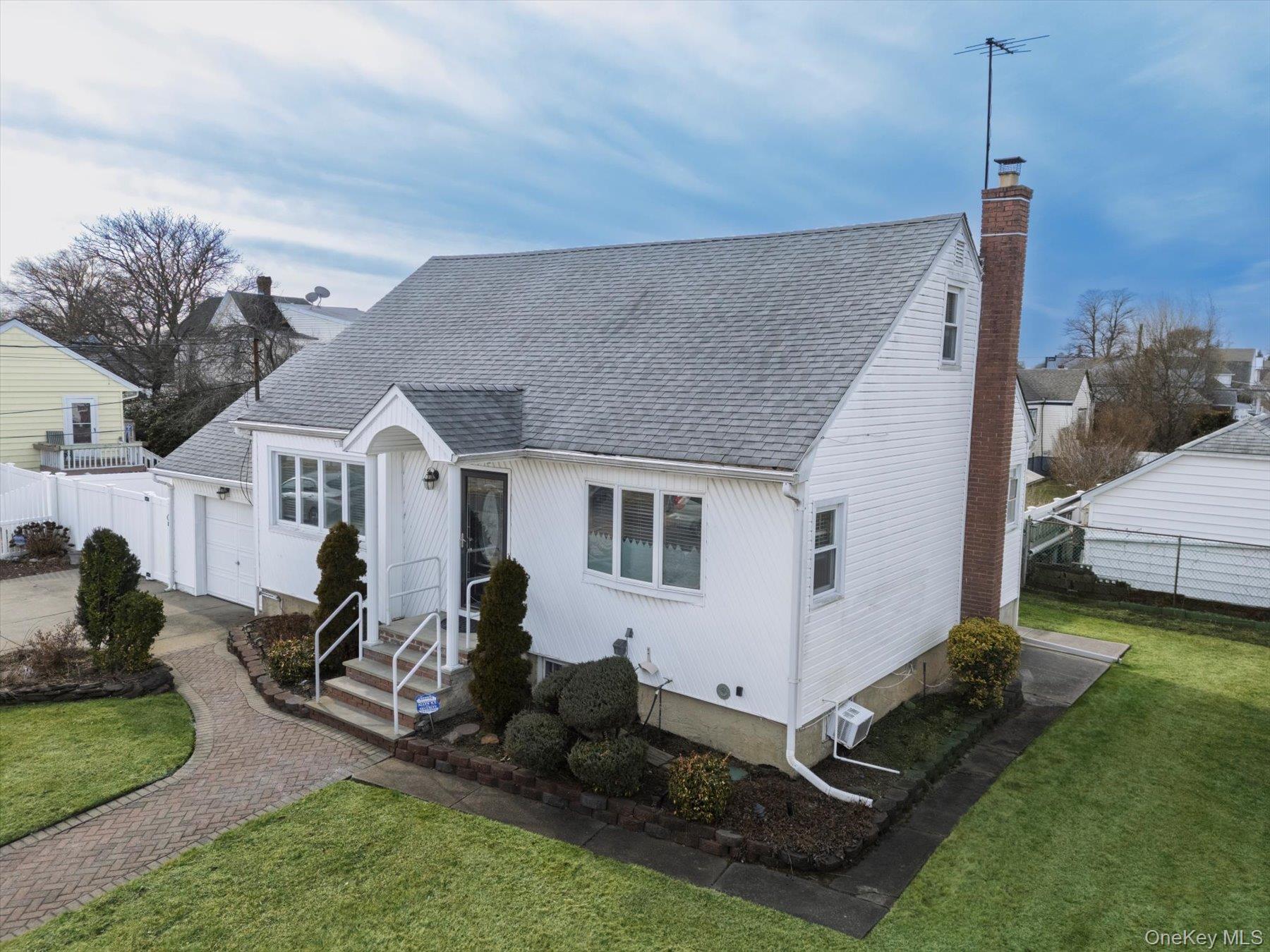 158 Roosevelt Avenue Freeport, NY 11520 - Photo 2 of 30 a view of a house with backyard